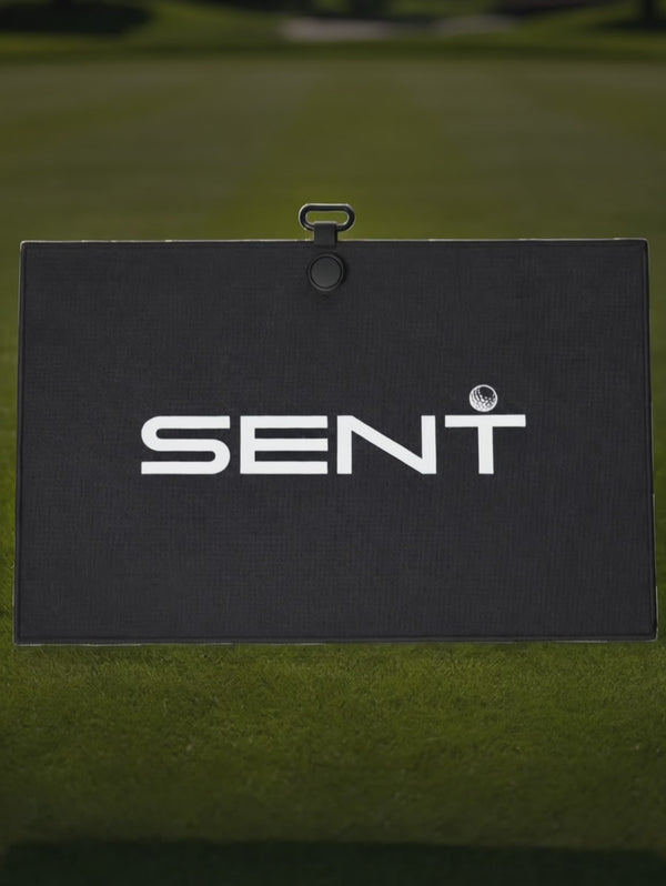 SENT magnetic golf towel picked up with a golf club